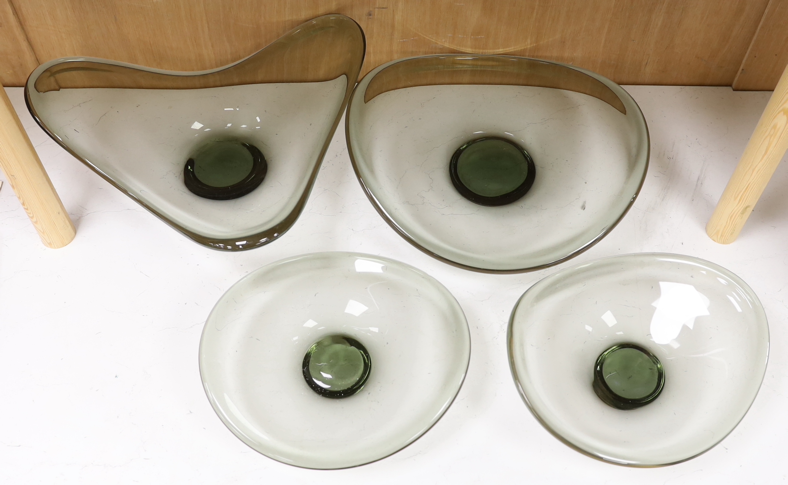 Four Holmegaard glass dishes, largest 39cm